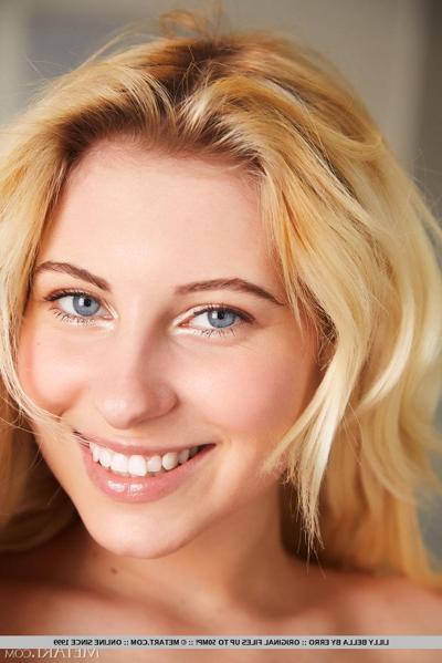18P Beautiful blonde teen Lilly Bella gets totally naked on a dining table