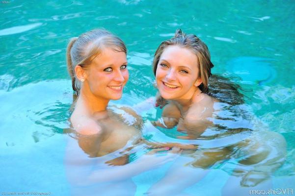 16P Nude girls take break from yoga routine to share lesbian kiss in swimming pool