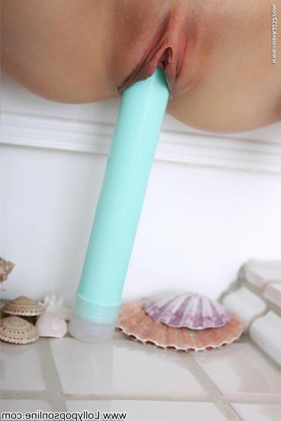 20P Sexy ginger Sophie Strauss removes her panties & rubs her pussy with a toy