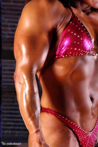20P Bodybuilder Tonia Moore shows off her muscles wearing a sexy bikini