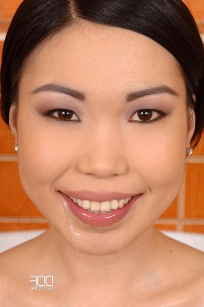20P Asian babe Nicoline takes a cumshot in her mouth in a steamy MFM oral 3some