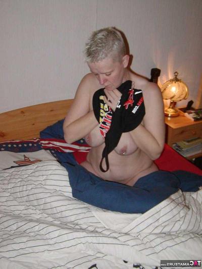 16P Older blonde with a pierced nipple Tiffany Pearl plays with her natural tits