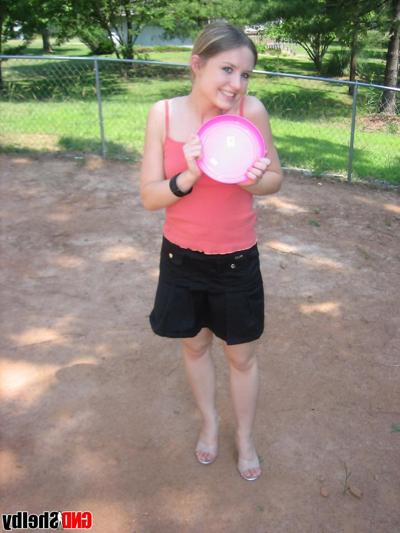2P Amateur girl flashes her tiny tits and panties while playing with a Frisbee