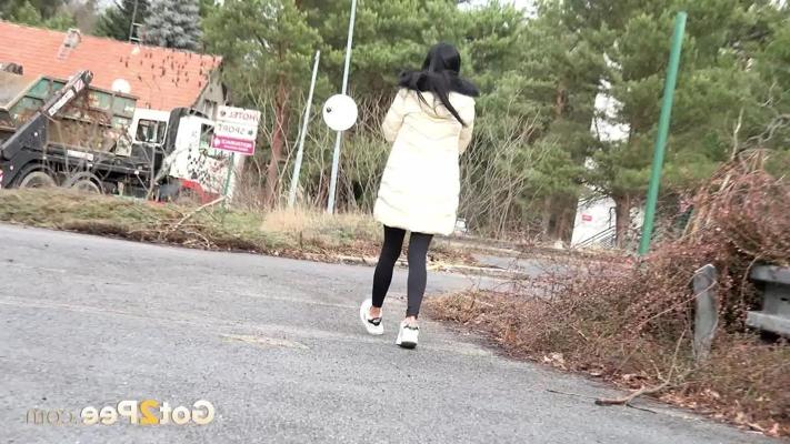 15P Dark-haired girl Maddi Black squats beside a car to take a piss