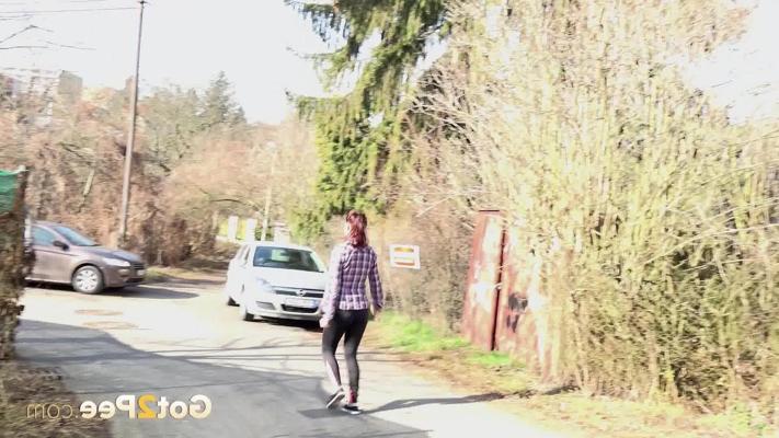 15P Caucasian girl Antonia Sainz squats for a piss on a paved road