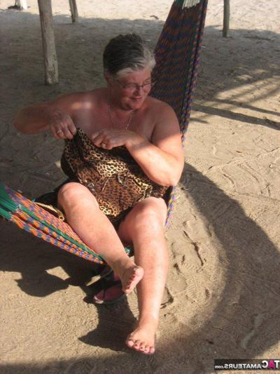 20P Obese nan Girdle Goddess bares her large tits and fat belly on a hammock
