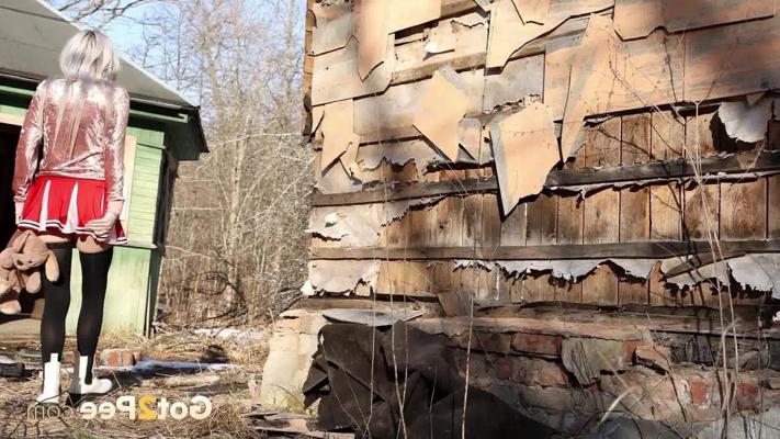 15P Hot blonde Vasya takes a piss in the doorway of a dilapidated dwelling