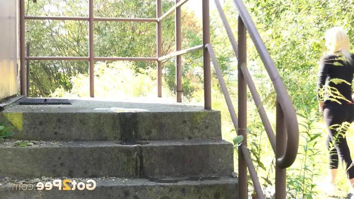 15P Beautiful blonde Nykla pulls down black leggings for a badly needed piss