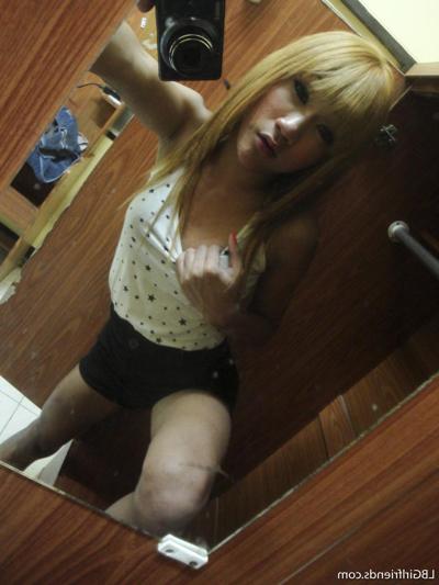 17P Skinny blonde ladyboy in high heel shoes Nan flaunts her nice cock and ass