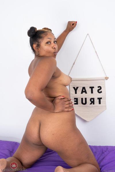 20P Chubby ebony babe Daisy shows her hairy pussy while flaunting her big ass