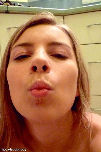 20P Amateur blonde Kathy unleashing and licking her big natural tits