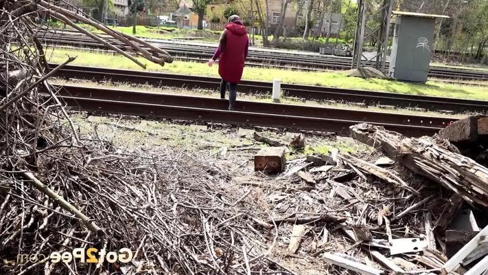 15P Pretty girl Lara Fox gets caught taking a piss near railway tracks