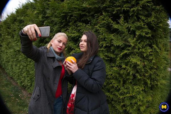20P Lovely mature lesbians Calina & Polina pose outdoors while taking selfies