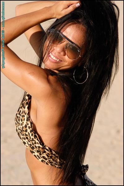 15P Asian bodybuilder Alma Villanueva models in high heels on a dry lake bed
