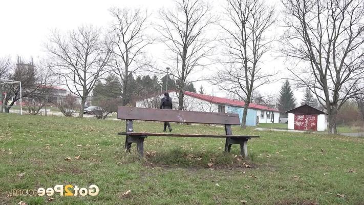 15P Short taken girl Amanda Estela pisses on a bench in a public park