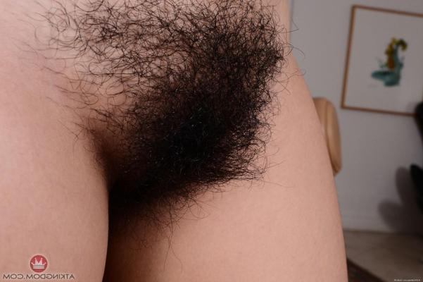 20P Cute Latina Nenetl Avril spreads her juicy ass cheeks and her hairy pussy lips