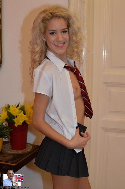 20P Blonde schoolgirl Monique Woods shows her small ass and poses in a solo
