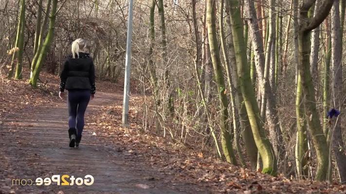 15P Blonde girl Licky Lex takes a pee in the woods after all the leaves have gone