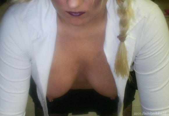 16P Blonde chick is silenced with a ball gag while showing her breasts