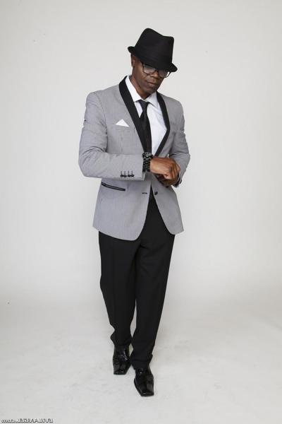 14P Ebony porn stud Sean Michaels posing suavely while wearing a classy suit