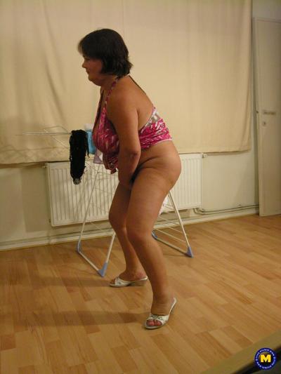 20P Chubby amateur nurse Tineke K strips and shows her big ass & tits