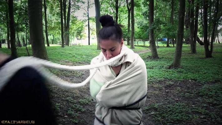 18P Brunette slave Athina tied to tree for outdoor spanking & deepthroat face fuck