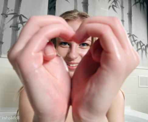 16P Sweet young girl Eve takes a bubble bath in a playful manner