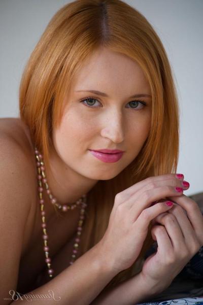16P Pale redhead Nikky B casts aside her see thru lingerie for nude posing
