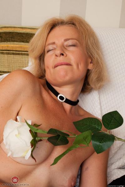 20P Mature Czech Diana unveils her tanned body & rubs her hairy twat