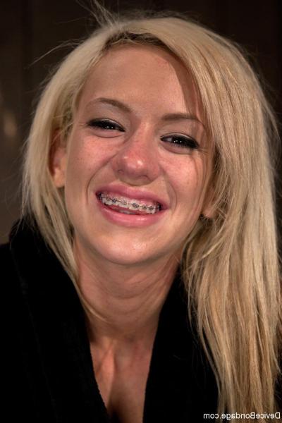 20P Submissive blonde Kaylee Hilton gets toyed while bound to a metal construction