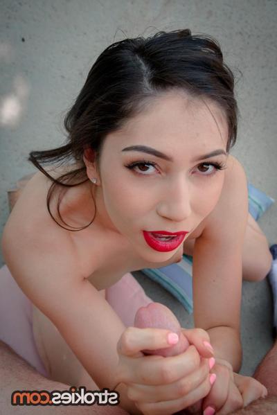 20P Teenage pornstar with red lipstick Judy Jolie sucks a nice dick poolside