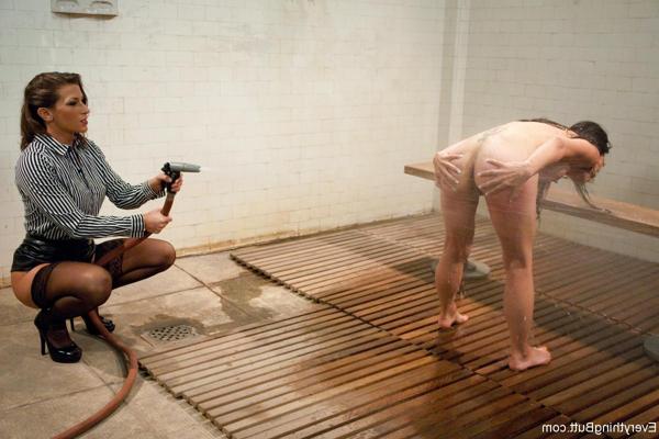 20P Asian inmate Tia Ling gets an enema before being hosed down by warden Ariel X