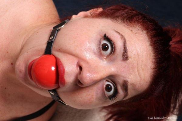 16P Thick redhead is hogtied in her lingerie while sporting a big ball gag