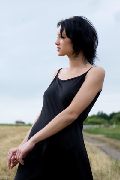 20P Alluring babe Loreen A shows off her medium tits & her protruding labia