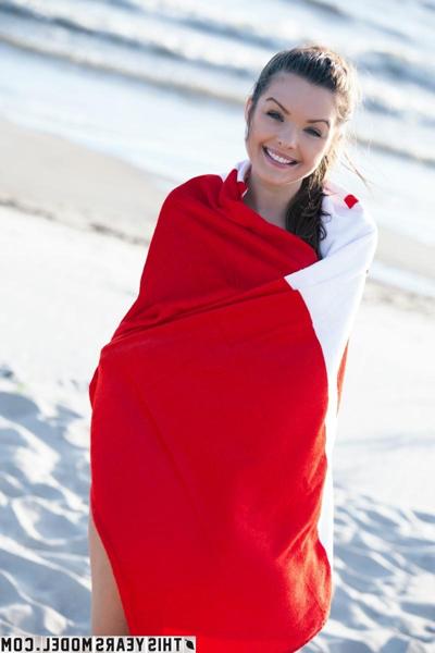 15P Canadian girl Michelle Jean tugs on her pigtail after getting naked on a beach