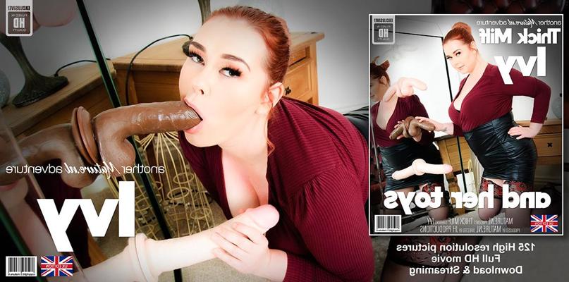 11P Thick redhead shows her big butt while sucking on suction dildos