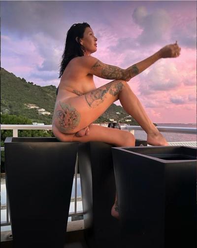 13P Mature shemale Morgan Bailey shows her tattoos while completely naked