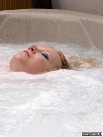 16P Overweight blonde Sindy Bust looses her huge boobs in an outdoor hot tub