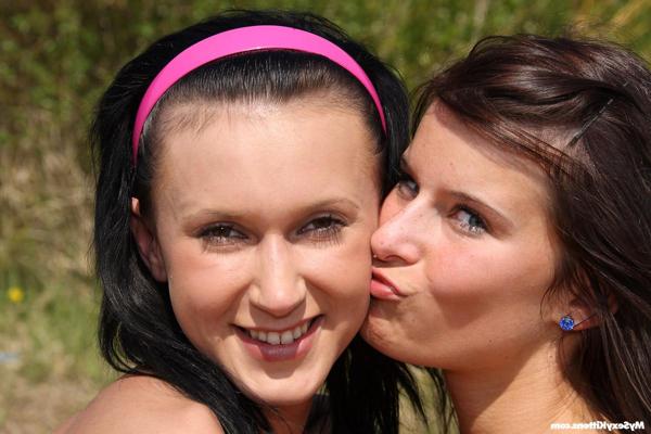 14P Young lesbians spread out a blanket by a pond before they dildo pussies