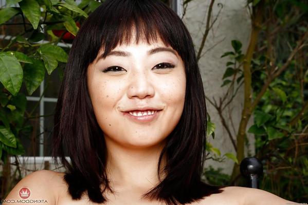 16P Petite Oriental model Miko Dai pulling labia lips wide open outdoors