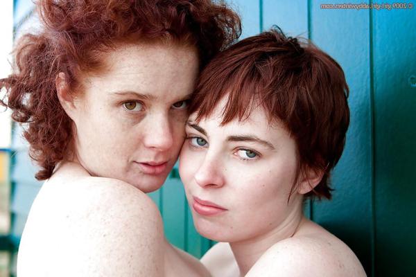 16P Redhead teens Maria S and Tricia L licking nipples and hairy cunts outdoors
