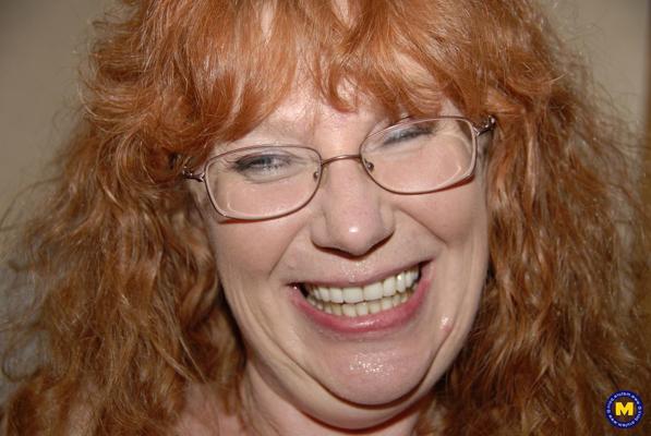 20P Curly-haired mature woman Sierra masturbates and gives a nice BJ