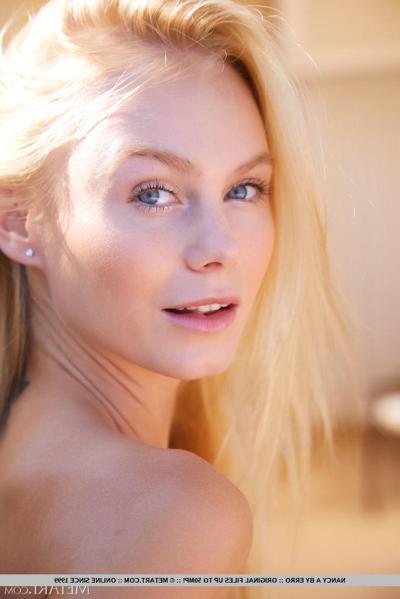 18P Beautiful blonde teen Nancy A gets totally naked on an indoor bench