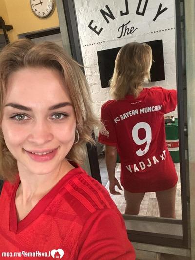 17P Beautiful brunette shows her big boobs while teasing in a jersey