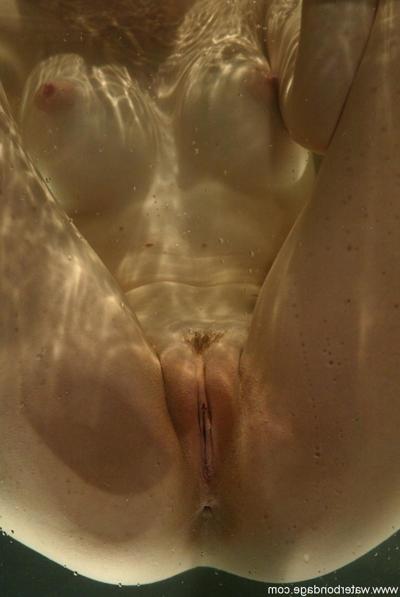 20P Sexy girl Sasha Sparks gets her twat toyed under water by a domme