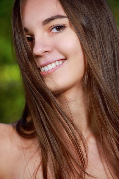 20P Brunette babe Valencia strips in nature and exposes her body with tan lines