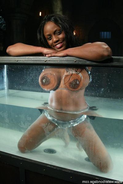 20P Busty ebony slave woman Jada Fire engages in water bondage fear play