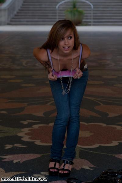 16P Charming girl uncovers her tiny boobs while out in public
