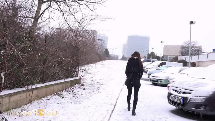 15P Caucasian girl Cynthia Vellons pees on a snow-covered sidewalk during the day