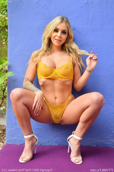 20P Amateur blonde babe Madelyn displays her big boobs and toys herself